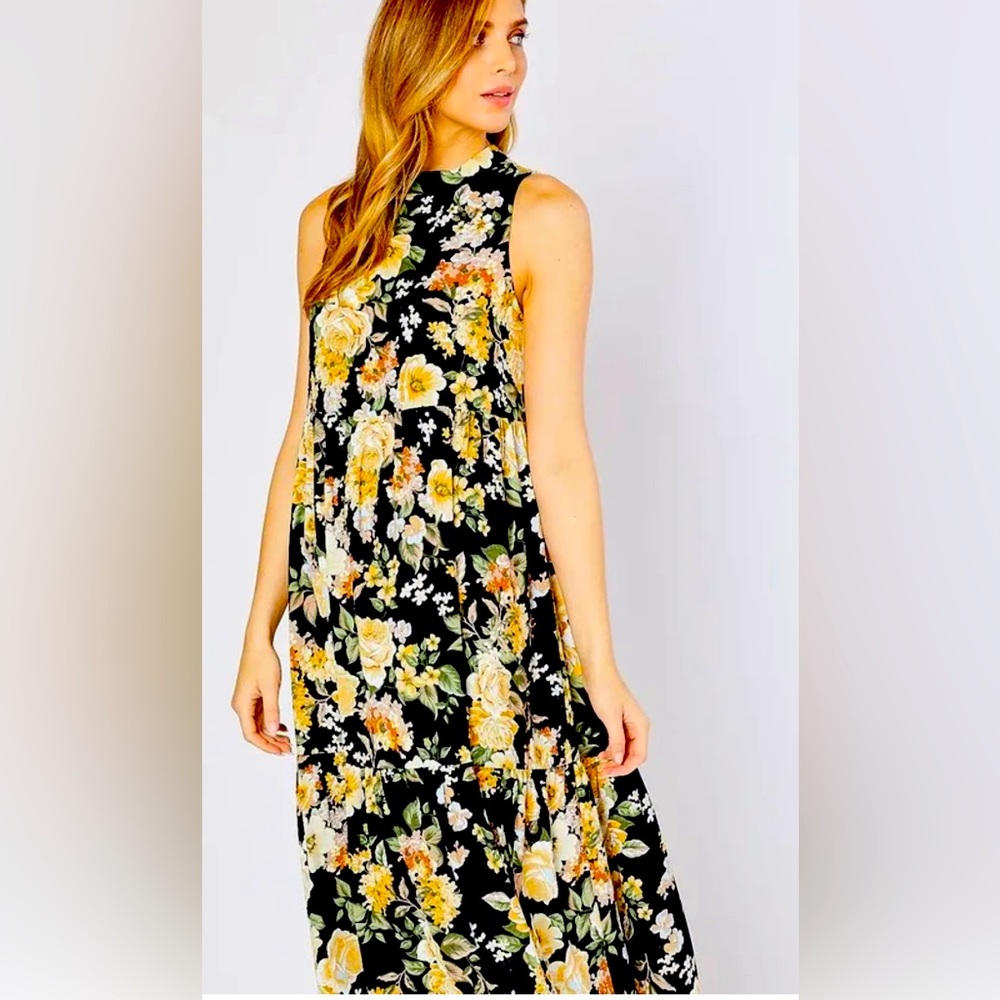 Flowy tiered dress with floral prints. Super cute with boots and all seasons.